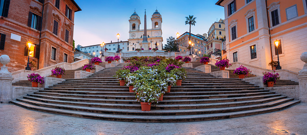 Panoramic cityscape image of Spanish Steps in Rome, Italy during sunrise.