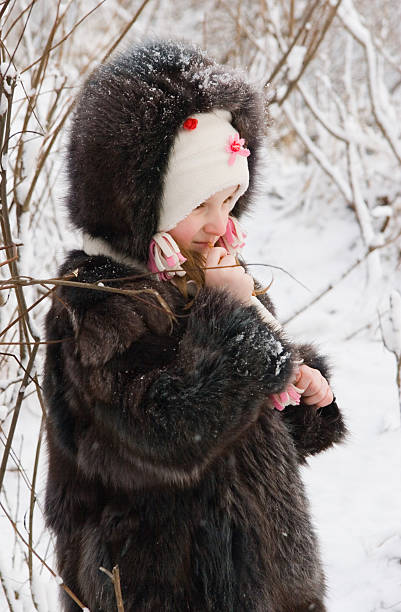istock little girl on the snow 95727755