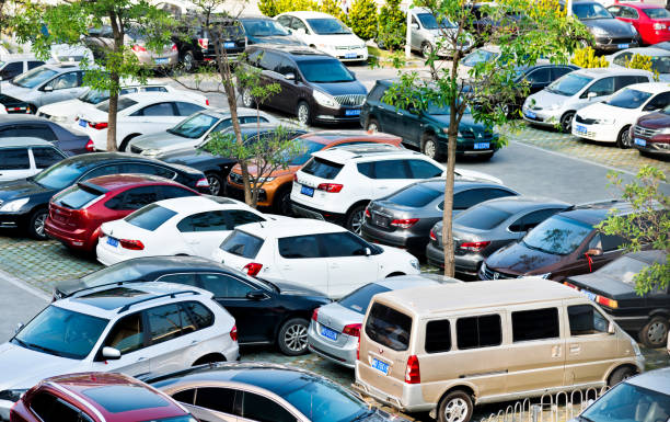 istock High angle view of parked cars 957278182