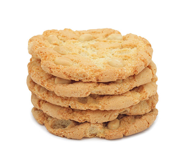 istock Pile of cookies stacked with nuts, isolated 95727831