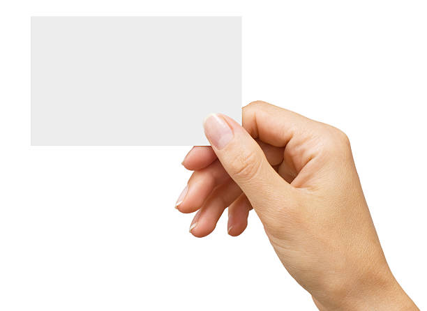 istock empty business card in a woman's hand 95728483