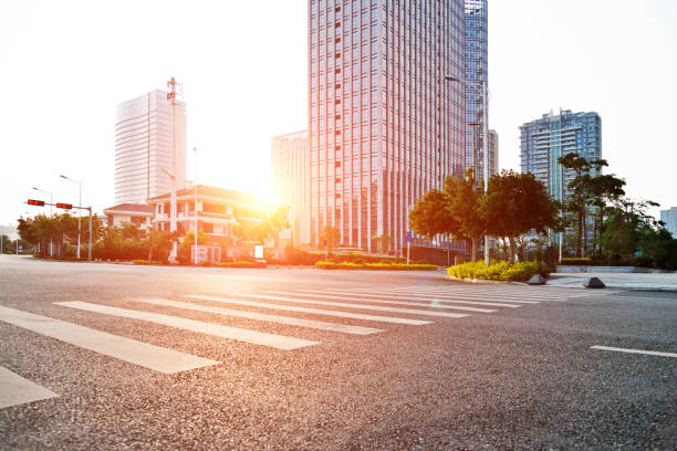istock Empty urban road and office buildings 957285222