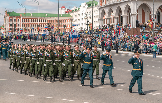 Yoshkar-Ola, Russia - May 9, 2018: Russian Military forces (soldiers and officers) are marching in the traditional military parade dedicated to the victory in the Second World War in Leninsky Prospekt