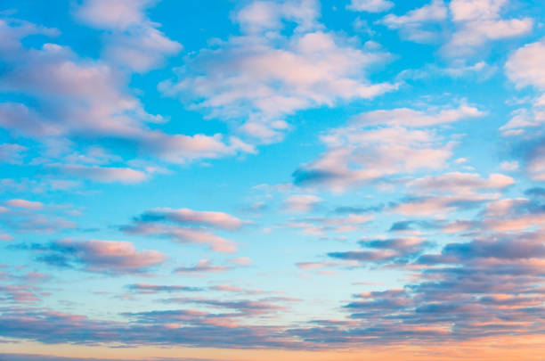 istock Alto cumulus beautiful clouds at sunset with a celestial gradient color. 957288750