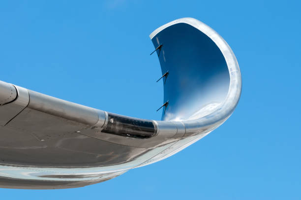 istock Wing and winglets close up flying in the sky. 957288896