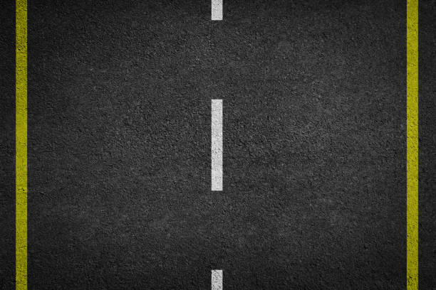 istock Asphalt road top view. Highway line marks. 957290078