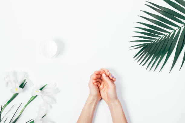 istock Female hands, cosmetic cream in a jar 957295078