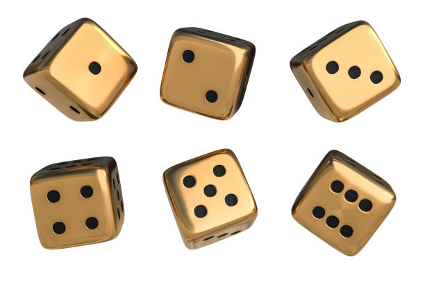 Set of golden dice with black dots isolated on white background stock photo