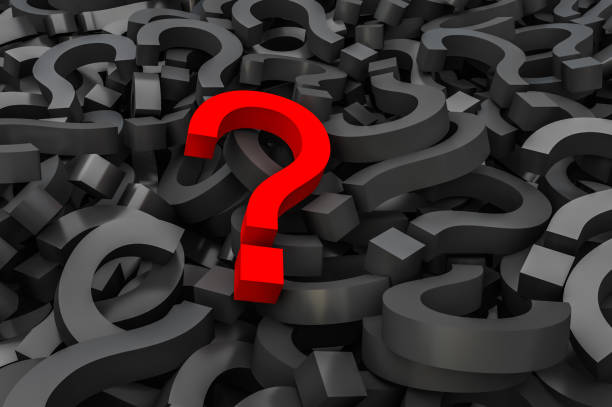 istock Red question mark on background of black question marks 957298990