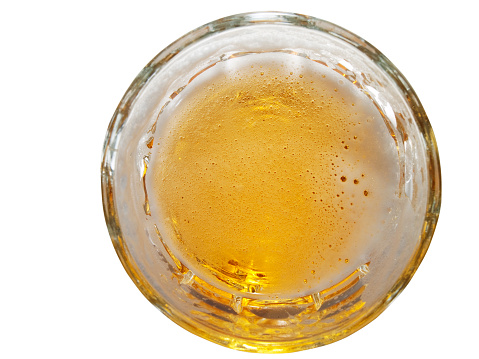Glass of light wheat beer isolated on white background with clipping path