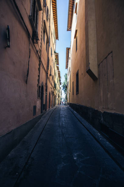 istock Small street of Florence 957308268