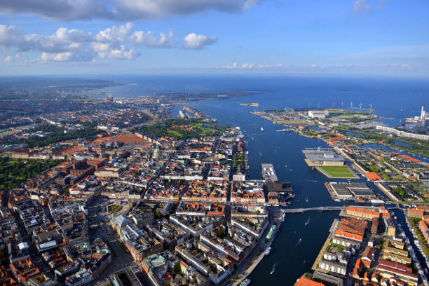 Copenhagen from the Air Aerial view of downtown and iconic old town area Nyhavn with danish traditional houses and water canals on a sunny day in Copenhagen, Denmark nyhavn stock pictures, royalty-free photos & images