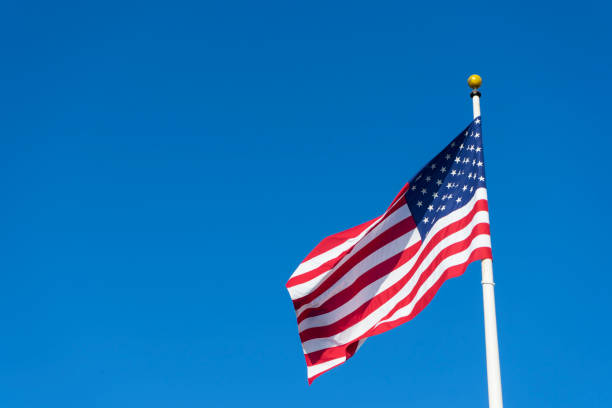 istock American flag waving 957316386