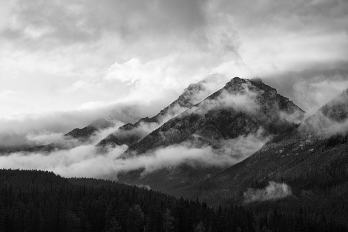 Clouds over mountain peaks, Banff National Park, Alberta, Canada