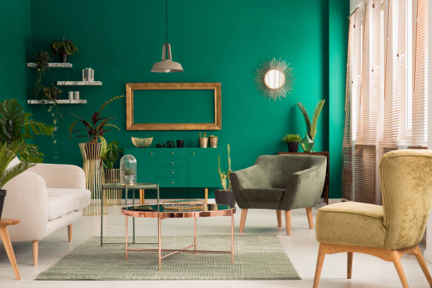 istock Green and gold living room 957320036
