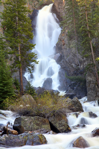 North Clear Creek Falls which drops 100 feet into the canyon, can be viewed from a side road along the Silver Thread Scenic Byway.