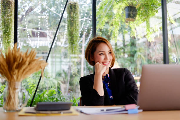 istock Business people working woman in modern office. 957327048