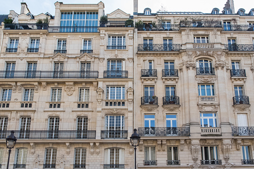 Paris, beautiful building in the center, typical parisian facade