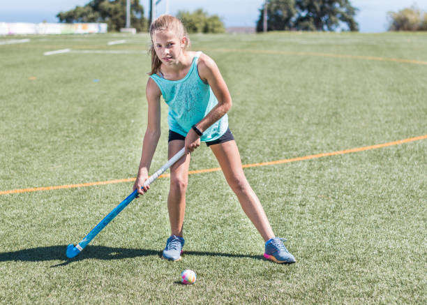 istock Sporty girl standing looking at camera 957340694