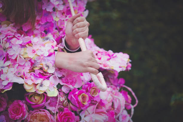 istock View at female hands and flowers 957349532