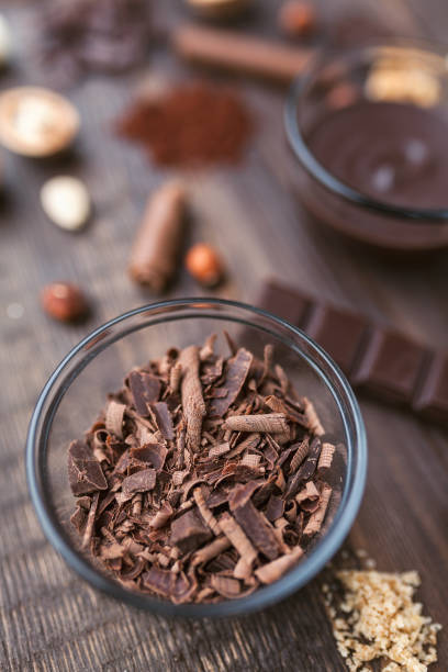 istock Delicious chocolate on wooden background 957349536