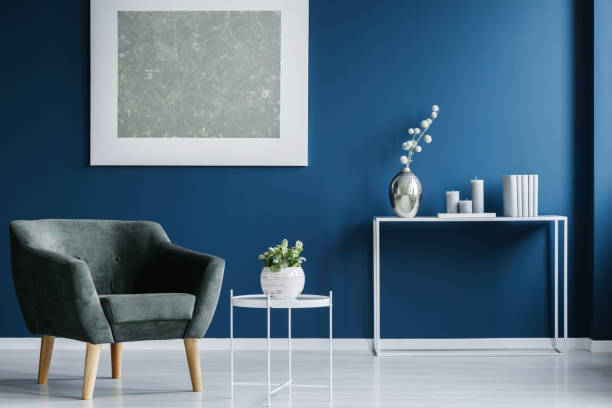 istock Navy blue living room interior 957360032
