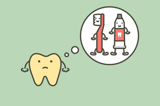 istock yellow tooth thinking of toothbrush and toothpaste, dental plaque 957360544
