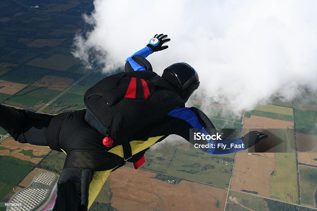 in da caduta libera-Sky Dive Skydiver - Foto stock royalty-free di A faccia in giù