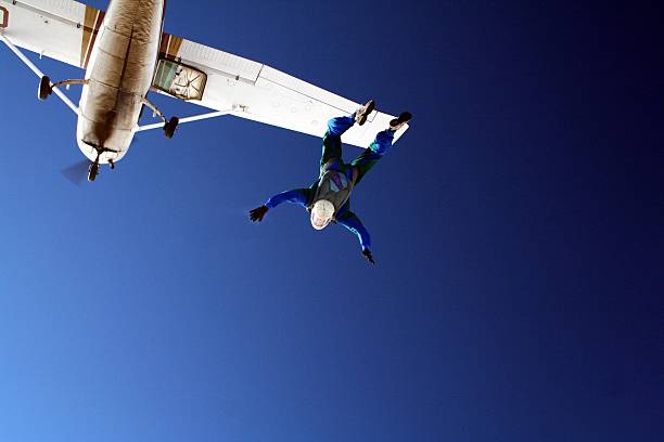 Skydiver jumping out of white airplane on clear blue sky A skydiver leaving a single engine airplane.


[url=/file_search.php?action=file&amp;filetypeID=0&amp;text=skydive&amp;userID=580088 t=_blank]Please see other skydive pictures from my portfolio[/url]: 
[url=/file_closeup.php?id=2218243][img]/file_thumbview_approve.php?size=1&amp;id=2218243[/img][/url][url=/file_closeup.php?id=1886355][img]/file_thumbview_approve.php?size=1&amp;id=1886355[/img][/url][url=/file_closeup.php?id=1277609][img]/file_thumbview_approve.php?size=1&amp;id=1277609[/img][/url][url=/file_closeup.php?id=1299255][img]/file_thumbview_approve.php?size=1&amp;id=1299255[/img][/url][url=/file_closeup.php?id=1296377][img]/file_thumbview_approve.php?size=1&amp;id=1296377[/img][/url][url=/file_closeup.php?id=1296417][img]/file_thumbview_approve.php?size=1&amp;id=1296417[/img][/url][url=/file_closeup.php?id=1668091][img]/file_thumbview_approve.php?size=1&amp;id=1668091[/img][/url][url=/file_closeup.php?id=1183120][img]/file_thumbview_approve.php?size=1&amp;id=1183120[/img][/url][url=/file_closeup.php?id=1241142][img]/file_thumbview_approve.php?size=1&amp;id=1241142[/img][/url][url=/file_closeup.php?id=1685864][img]/file_thumbview_approve.php?size=1&amp;id=1685864[/img][/url][url=/file_closeup.php?id=1844701][img]/file_thumbview_approve.php?size=1&amp;id=1844701[/img][/url][url=/file_closeup.php?id=2216086][img]/file_thumbview_approve.php?size=1&amp;id=2216086[/img][/url][url=/file_closeup.php?id=1890366][img]/file_thumbview_approve.php?size=1&amp;id=1890366[/img][/url][url=/file_closeup.php?id=1277711][img]/file_thumbview_approve.php?size=1&amp;id=1277711[/img][/url][url=/file_closeup.php?id=1310449][img]/file_thumbview_approve.php?size=1&amp;id=1310449[/img][/url][url=/file_closeup.php?id=1274267][img]/file_thumbview_approve.php?size=1&amp;id=1274267[/img][/url][url=/file_closeup.php?id=1274355][img]/file_thumbview_approve.php?size=1&amp;id=1274355[/img][/url] [url=file_closeup.php?id=1668104][img]file_thumbview_approve.php?size=1&amp;id=1668104[/img][/url] leap of faith stock pictures, royalty-free photos & images