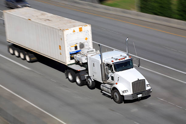 istock White Truck - panned 95736309