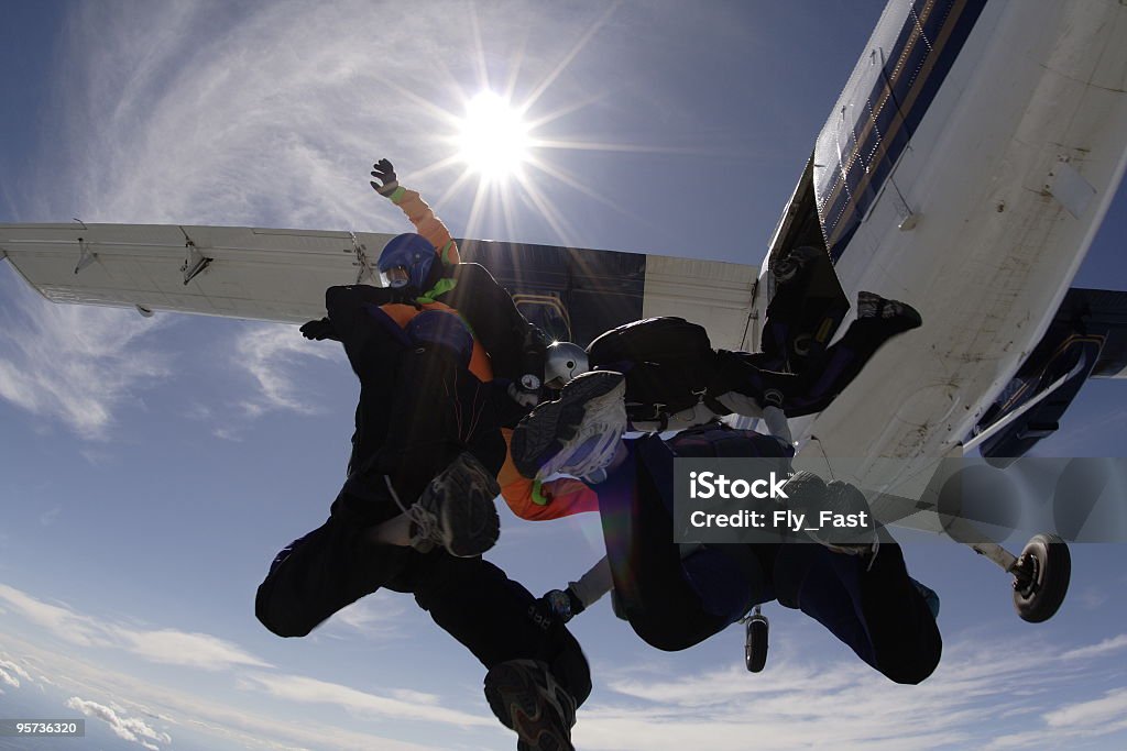 Четыре Skydivers выходе Самолет - Стоковые фото Безопасность роялти-фри