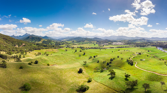 Aerial view of farmland near the town of Murwillumbah and Wollumbin National Park (Mt Warning) in rural New South Wales, Australia