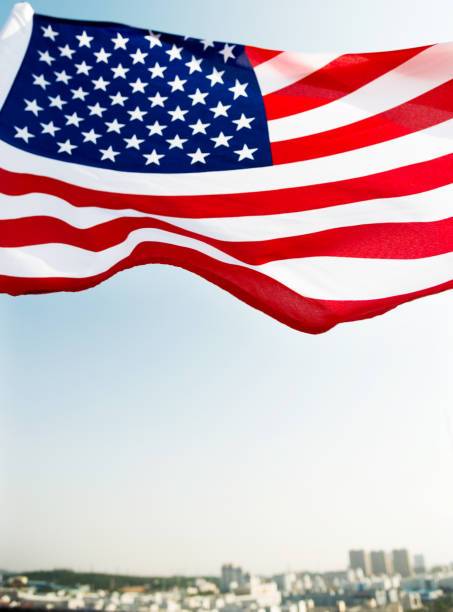 istock Waving American flag and building 957365094