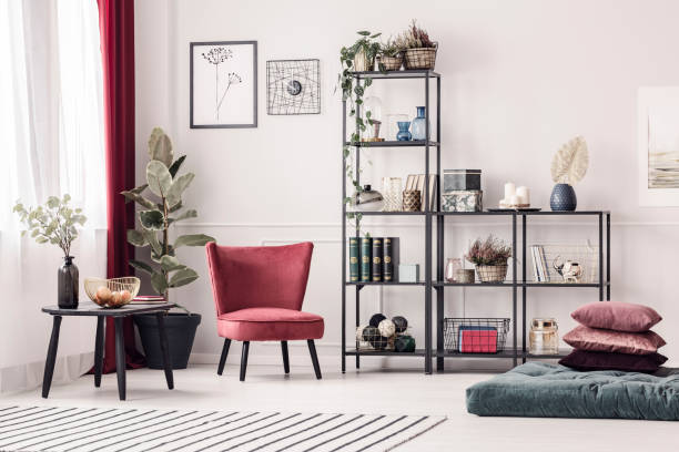 istock Red armchair in living room 957365112