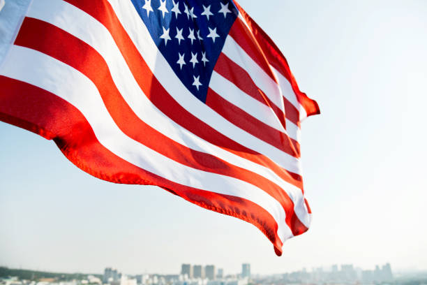 istock Waving American flag and building 957365148