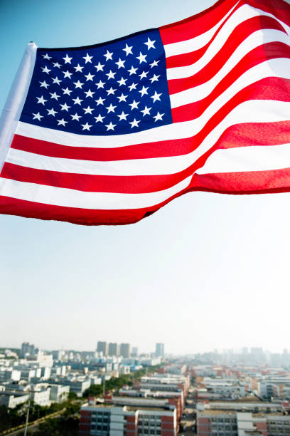 istock Waving American flag and building 957365232