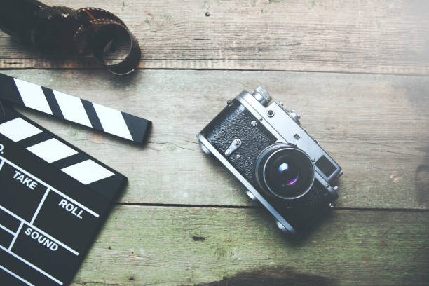istock cinema with video sign and camera on table 957365322