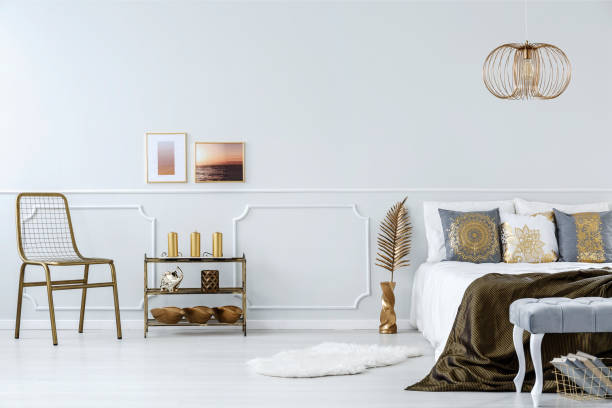 istock Gold accents in bedroom 957368956