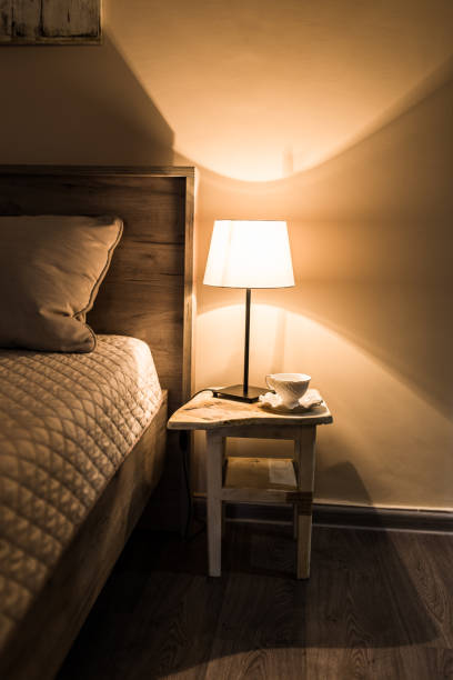 istock Night stand in modern bedroom 957369080