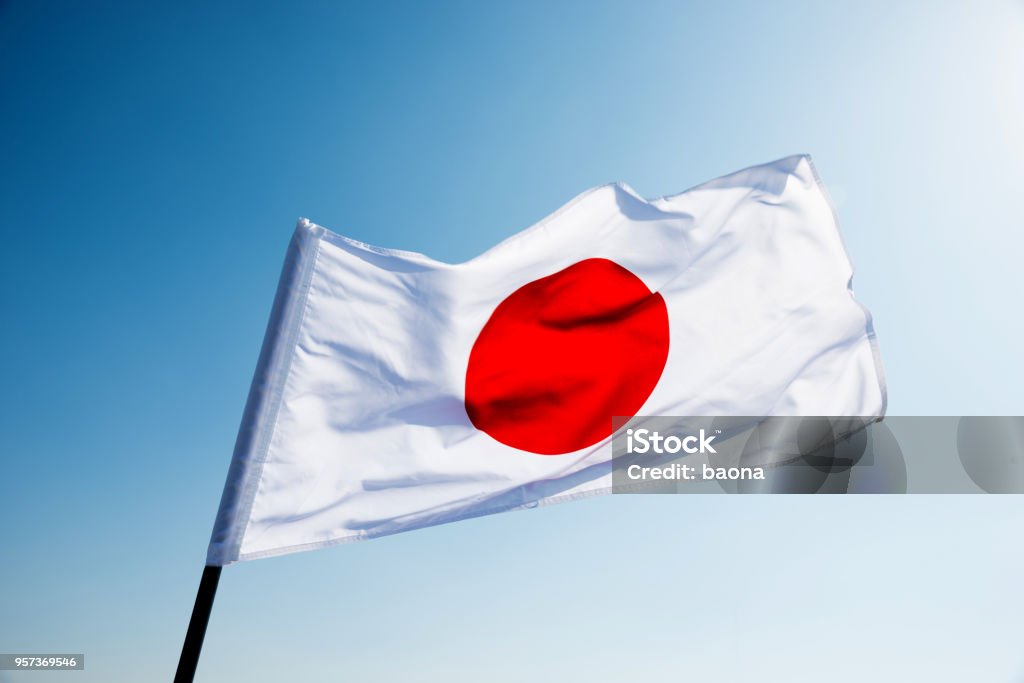 日本の国旗を振って、風 - 日本の国旗のロイヤリティフリーストックフォト
