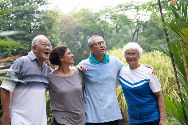 istock Group of active seniors in the park 957370038
