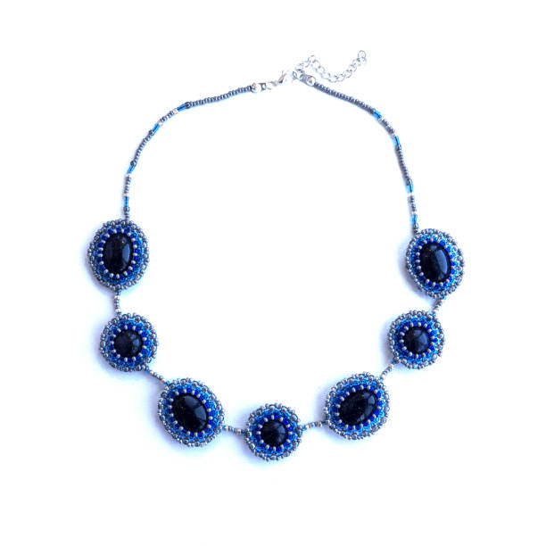 istock Handmade elegant blue necklace from natural stones, beads. 957372744