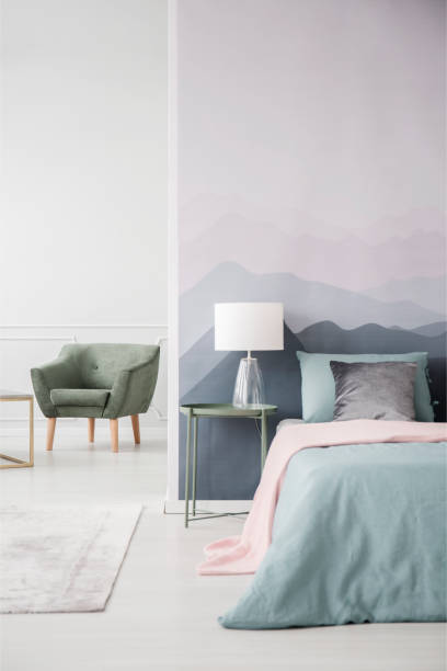 istock Green bedroom interior with armchair 957373976
