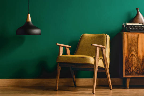 istock Yellow armchair and retro typewriter 957376128