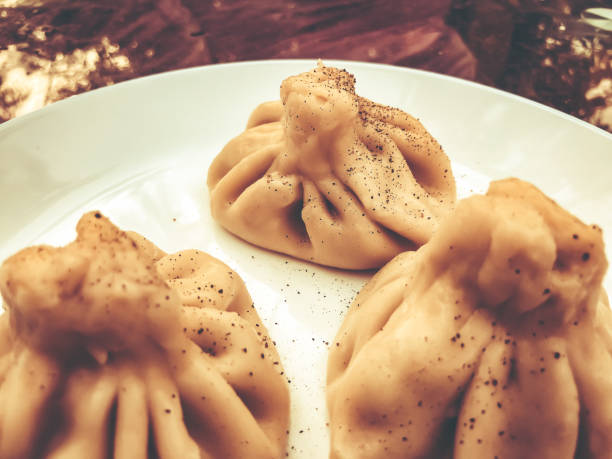istock Cooked khinkali traditional Georgian dish. 957376296