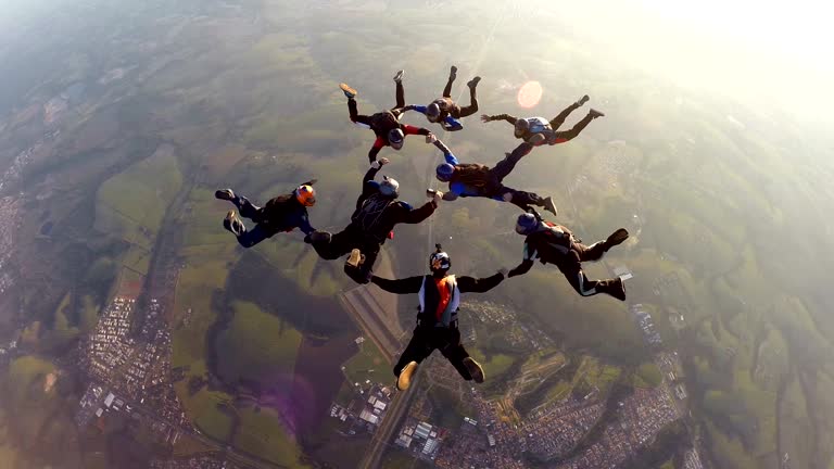 Skydiving friends at the sunset