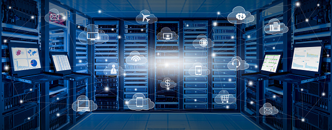 Internet data center room with server and networking device on rack cabinet and kvm monitor with charts on screen and cloud services icon with connection lines, cloud computing concept