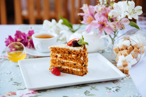 istock Tasty oldfashioned cake with cream on the table. 957379480