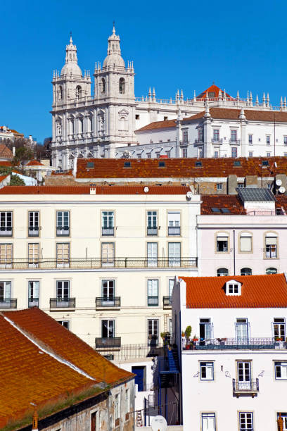 istock Sao Vicente de Fora Monastery and Alfama District orange rooftops 957380190