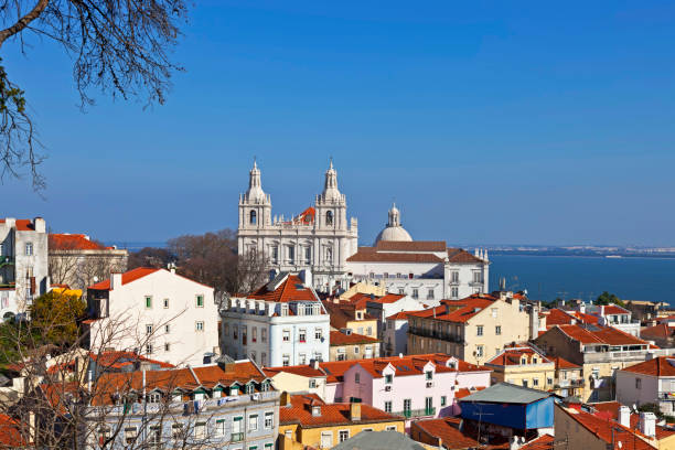 istock Sao Vicente de Fora Monastery, Alfama District orange rooftops 957380236